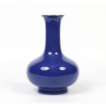 A Chinese blue glazed bottle vase. Lilac glazed base, unmarked, 33cm high. Condition Report. To be