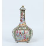 A nineteenth century Cantonese bottle vase and cover. Painted in coloured enamels with panels of