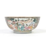 An eighteenth century Chinese punch bowl. With four gilt scroll cartouches containing enamelled