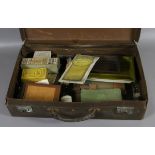 A small suitcase of 1920s photographic equipment.