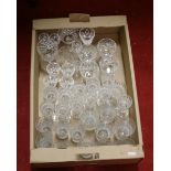 A box and contents of Edwardian suite of wine glasses and twenty four cut glass tumblers along with