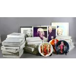Four framed Marilyn Monroe prints and eighteen boxed Monroe cabinet plates.