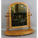 A Victorian satinwood toilet mirror on stand.