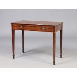 An Edwardian mahogany single drawer side table, with strung inlay and raised on square tapering