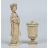 A Japanese carved ivory small okimono formed as a geisha along with a European carved ivory