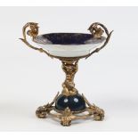 A twentieth century Sevres style pedestal bon bon dish with gilt metal mounts, 18cm. Condition