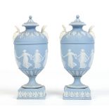 A fine pair of nineteenth century Wedgwood solid jasper covered vases. With twin satyr loop handles,
