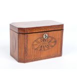 A Georgian satinwood rectangular tea caddy with canted corners. Cross banded in mahogany and with