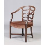 A Georgian mahogany carver armchair. With openwork backrest and reeded mouldings.  Condition Report.