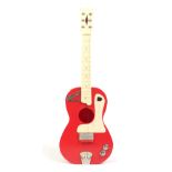 A Redjet Electric childs semi acoustic guitar.