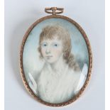 A Georgian yellow metal brooch / pendant set with an ivory portrait miniature of a young boy, 6.
