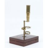 An early nineteenth century lacquered brass botanic field microscope in fitted mahogany case by
