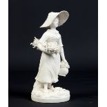 A Rockingham biscuit porcelain figure, the Swiss girl. Dressed in country attire carrying a basket