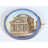 A nineteenth century oval micromosaic brooch in yellow metal mount. Depicting the Pantheon in Rome