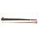 A copper hunting horn in tin case, horn 103cm. Condition Report. To be used as a guide only. Heavily