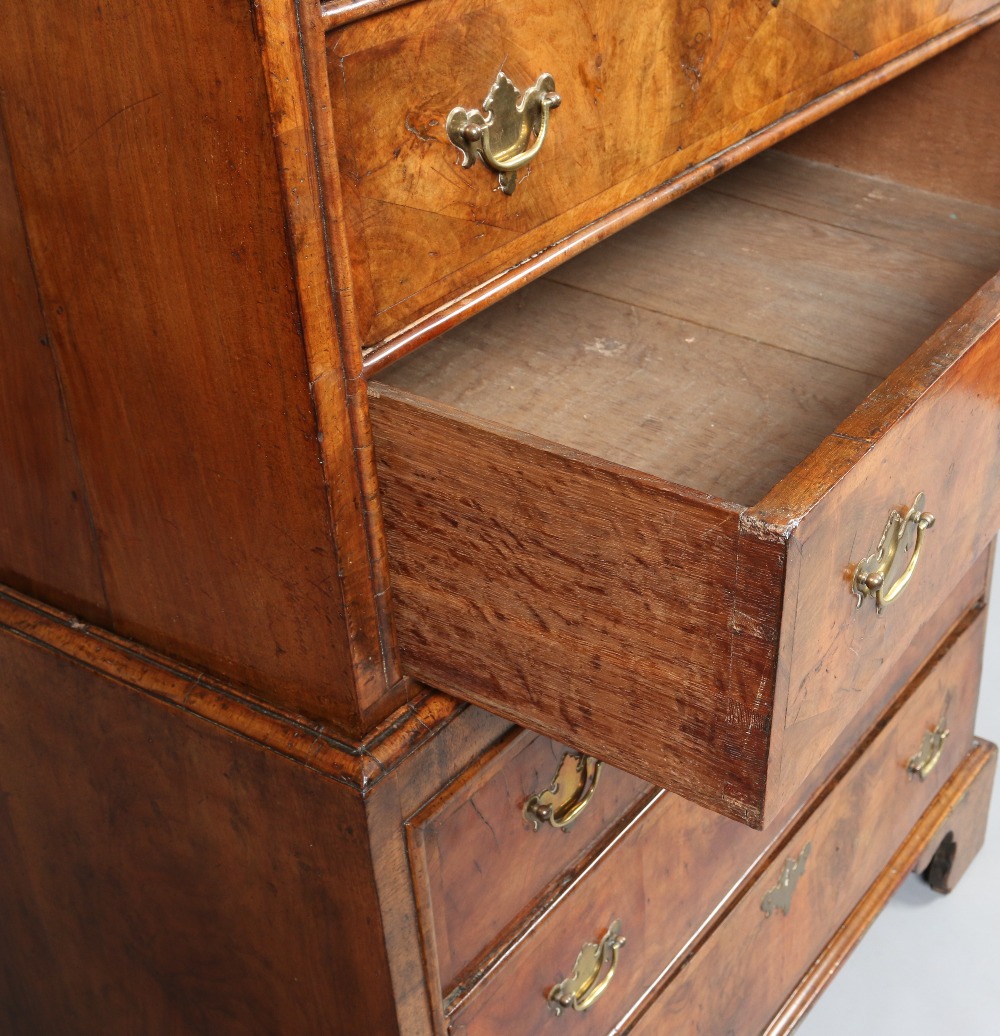 A Queen Anne figured walnut chest on chest. With concealed drawer to the moulded frieze, - Image 3 of 5