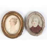 A nineteenth century ivory portrait miniature of a young woman in gilt metal frame and another