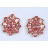 A pair of 18 carat gold cluster stud earrings set with ceylon padparadscha sapphires. Total 4.5ct,