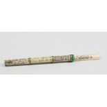 A Chinese carved bone cased chopstick eating set with penwork decoration, 29.5cm. Condition