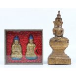 An Oriental carved gilt wood Buddha and two similar Buddha on thrones in a glazed case. Single