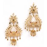 A pair of high carat gold Indian openwork earrings with green and red enamel detail, total 11.43