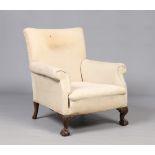 A nineteenth century upholstered armchair raised on carved ball and claw supports. Condition Report.