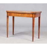 A Victorian inlaid mahogany fold over tea table raised on square supports, 91cm wide. Condition
