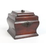 A George III mahogany square ogee tea caddy. With brass loop handle, pagoda shaped cover opening