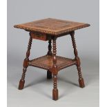 A Victorian marquetry work single drawer occasional table raised on splay bobbin turned supports.