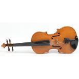 A cased German violin and two bows with one piece back, 35.5cm.