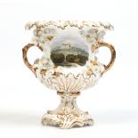 A Rockingham vase of campana form. Decorated with applied flowers and leaves with burnished and matt