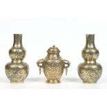 An assembled garniture of Chinese bronze vases. Pseudo reign marks, largest 20cm. Condition