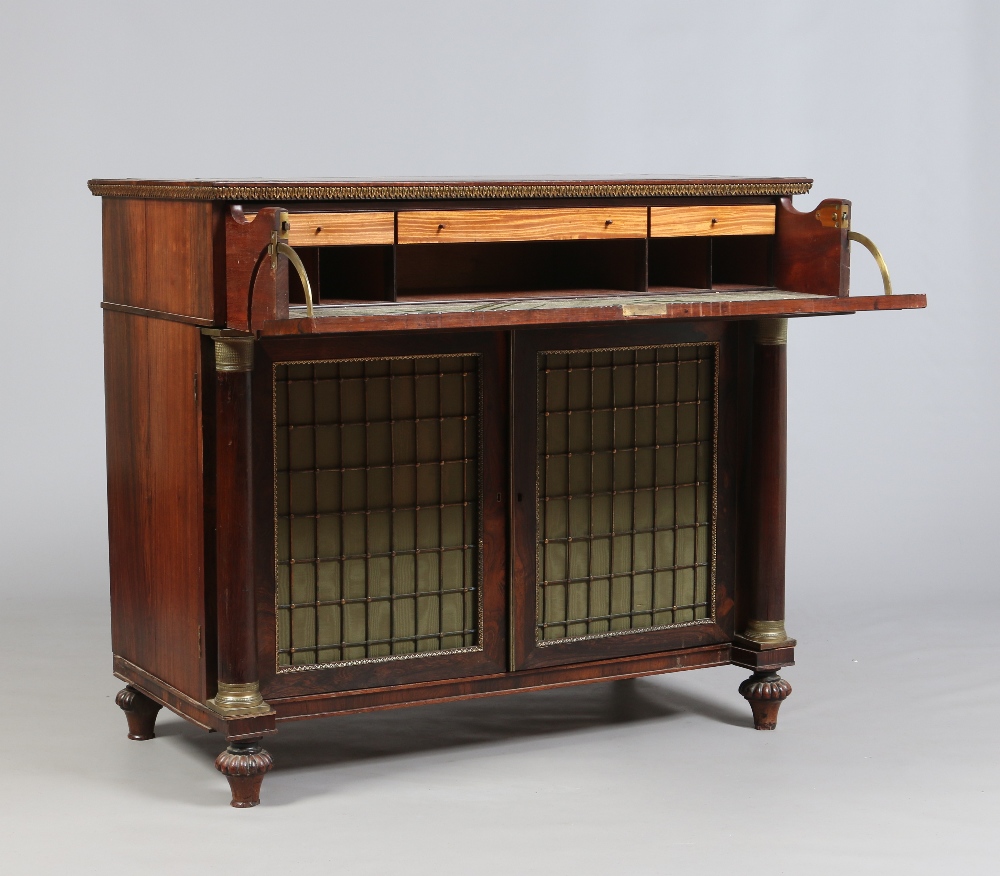 A Regency rosewood secretaire chest. With brass inlay and raised over a cupboard base with grill - Image 3 of 3