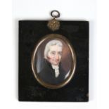 An early nineteenth century portrait miniature of a gentleman in the manner of Archibald