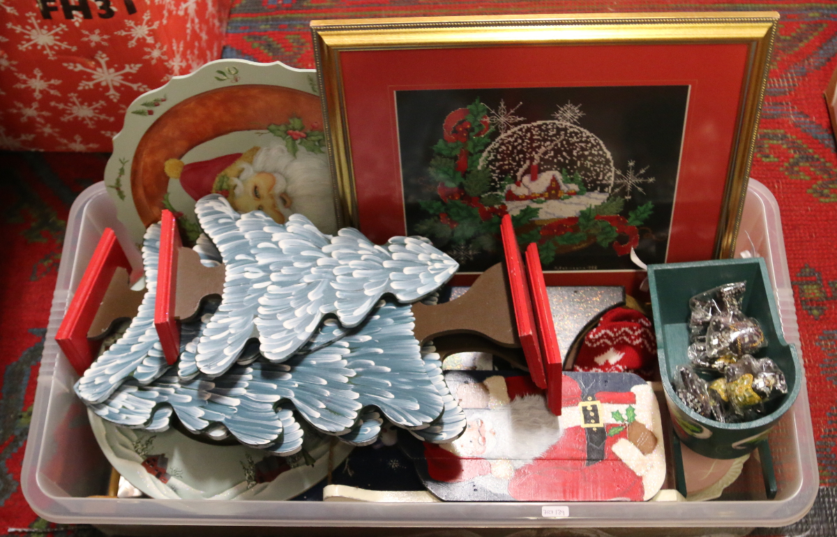 A box of home made wooden Christmas decorations and prints etc.