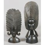 Two African ebony carvings each formed as a shouldered length portrait bust of a tribeswoman.