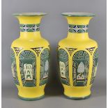 A pair of large decorative pottery vases.