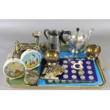 A tray of collectable metalwares to include 1970s World Cup coins, babies teething rattle,