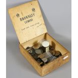 A Bromley lemon hand lotion stencilled box and collection of coins and banknotes.