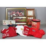 A collection of Manchester United memorabilia to include a wall clock,