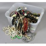 A large box of assorted costume jewellery mostly necklaces and bangles etc.