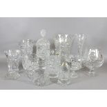 A collection of cut glass items to include vases and decorative items.