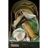 A box of miscellaneous pottery china and glass to include plaster cast wall chargers,