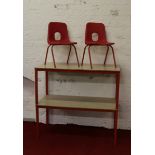 Two painted steel childrens tables and two bucket chairs.