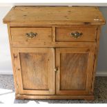 A Victorian pine side cupboard.