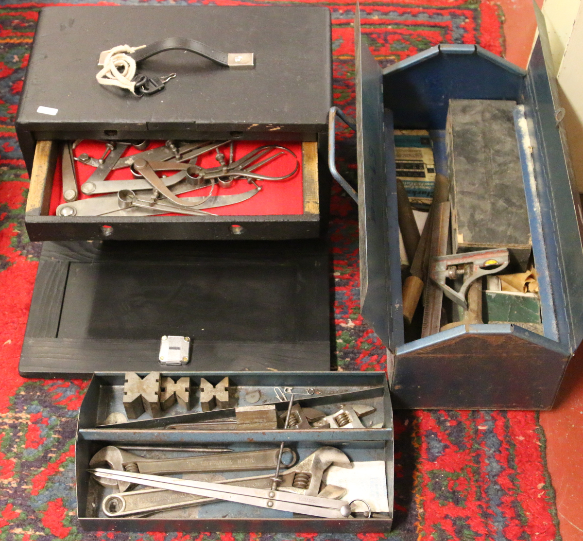 Two metal tool boxes to include engineers taps and dyes, micrometers, measures etc,