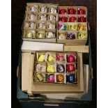 A collection of vintage boxed Christmas decorations.