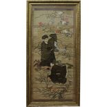 An early twentieth century gilt framed Japanese needlework picture. Two gentleman dressed in robes