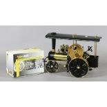 A West German model Wilesco Traktor steam engine with accessories.