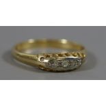 A mid 20th century 18 carat gold and platinum five stone diamond ring in boat shaped setting,